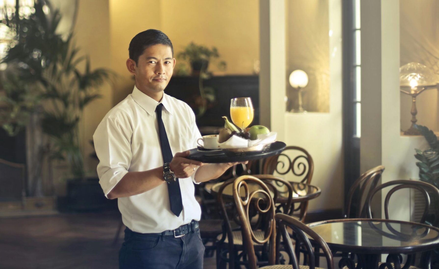 waiter serving food